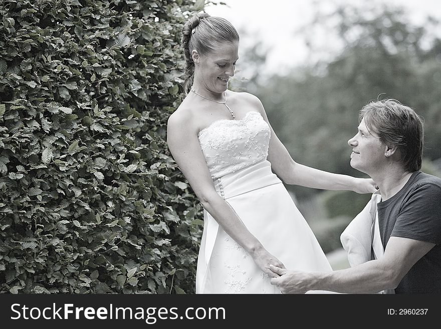 pictures shooten on a wedding day from newly weds at a park. pictures shooten on a wedding day from newly weds at a park