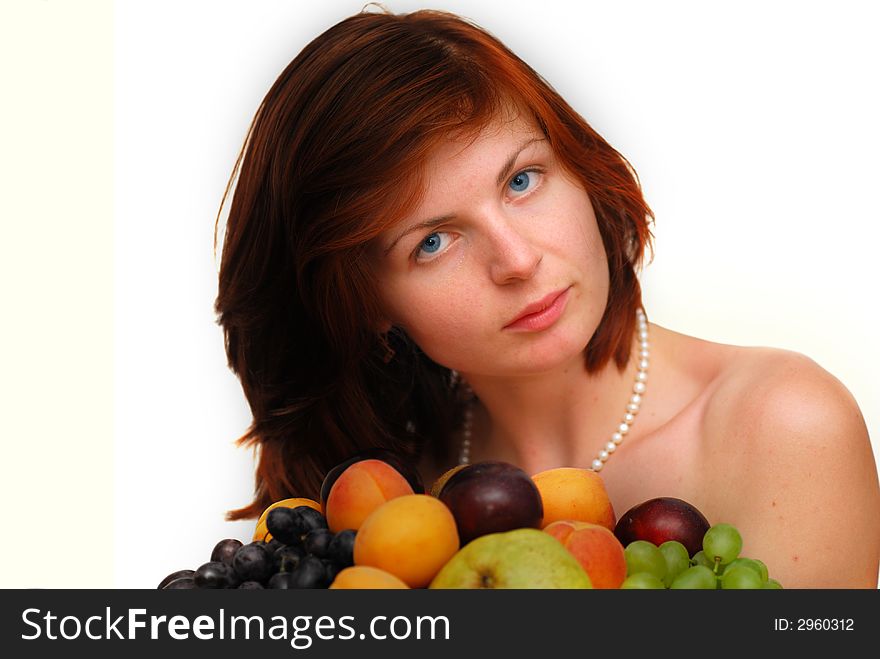 Pretty girl with many colorful fruits on white background. Pretty girl with many colorful fruits on white background