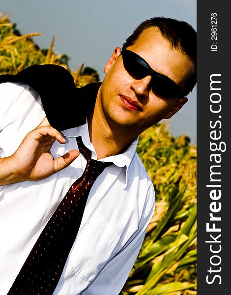 Business man in a corn field