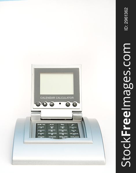 Calculator with calendar isolated over white background.