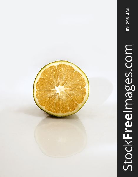 Half of an orange isolated over white background. Half of an orange isolated over white background