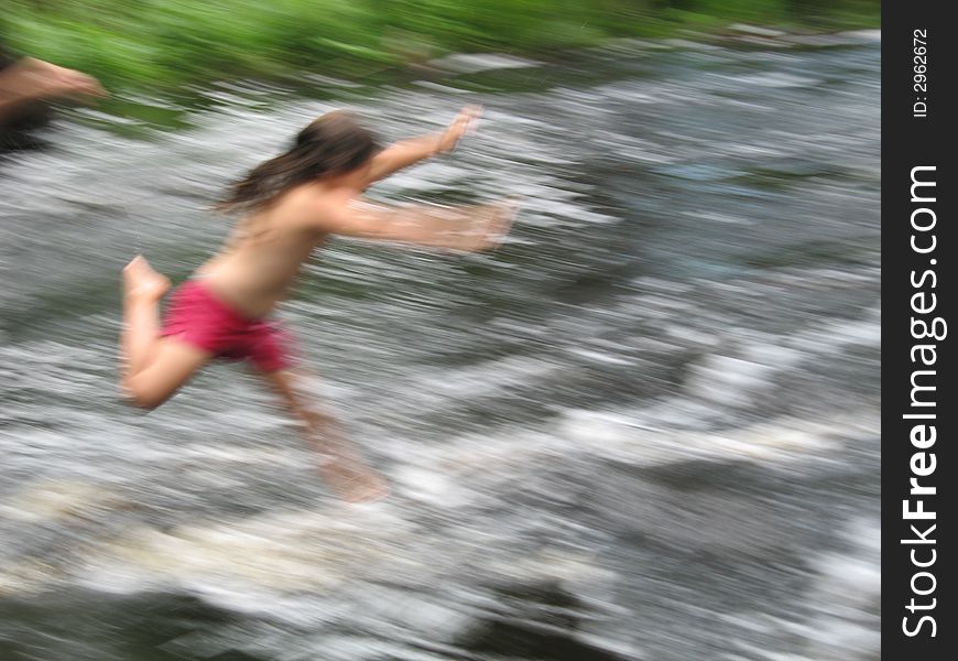 Fearless girl jumping into river. Fearless girl jumping into river