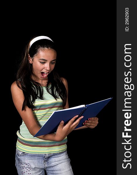 Girl posing for back to school theme over black background