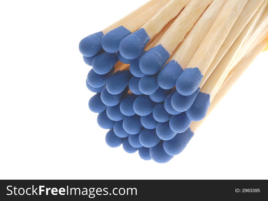 Bunch of blue matches on light box