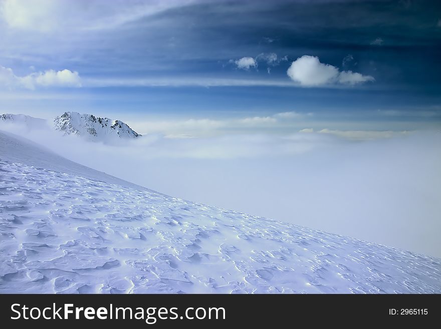 View over clouds and sky. Tien Shan, Kazakhstan. View over clouds and sky. Tien Shan, Kazakhstan