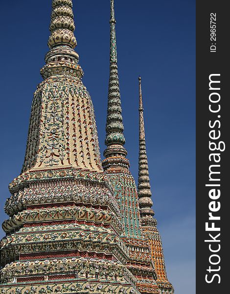 Three large chedis in the grounds of Wat Pho, Bangkok. Three large chedis in the grounds of Wat Pho, Bangkok