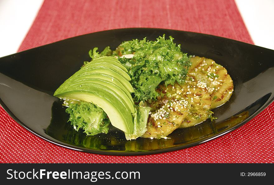 Vegetarian salad with pineapple and avocado. Vegetarian salad with pineapple and avocado