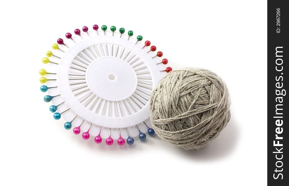 Pins and ball of thread