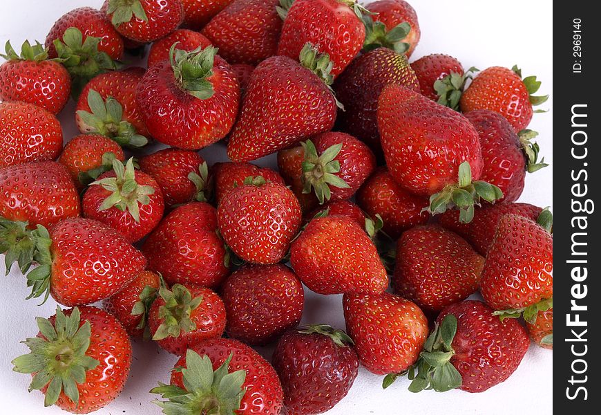 A pile of fresh strawberries