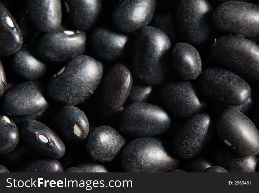 A background photo of black beans texture. A background photo of black beans texture
