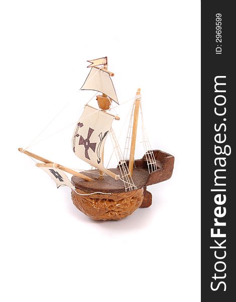 Model of old ship on the white background