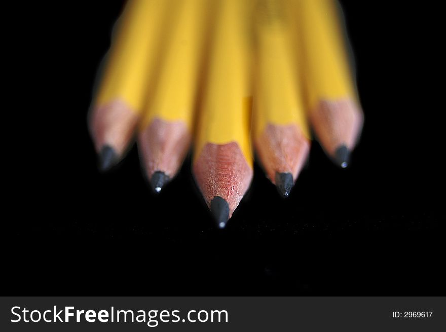 A diagonal row of pencils. Shallow depth of field. A diagonal row of pencils. Shallow depth of field.