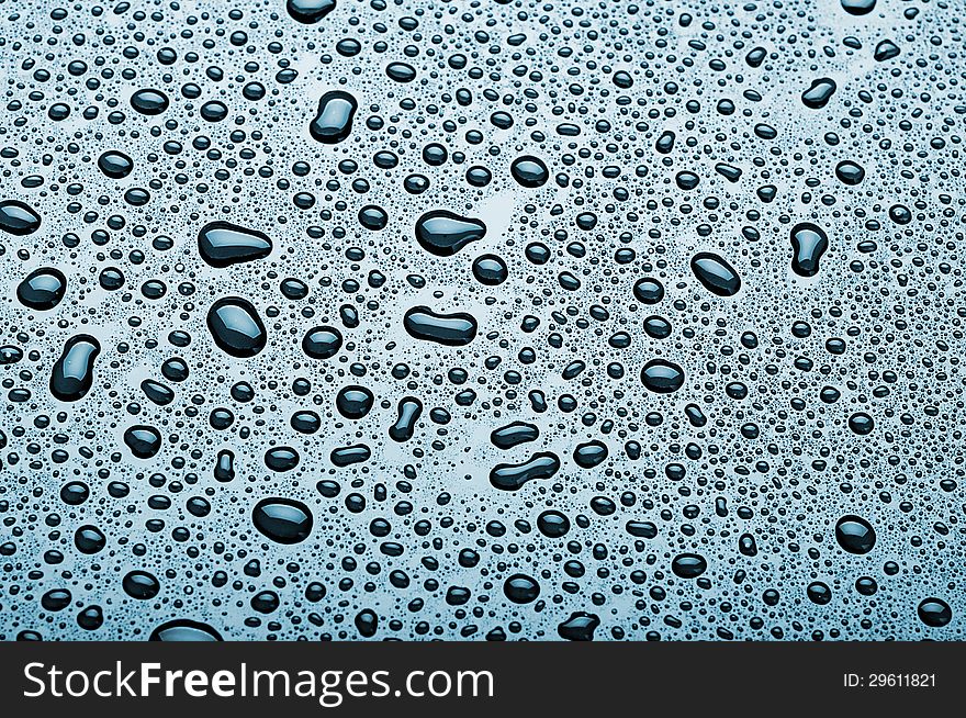 Water droplets are blue. abstract background