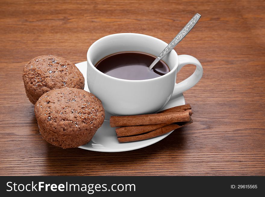 Cup of coffee and muffins. Cup of coffee and muffins