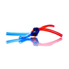 Two Red And Blue PVC Hoses Tied Royalty Free Stock Photography Two Red And Blue PVC Hoses Tied Royalty Free Stock Photography