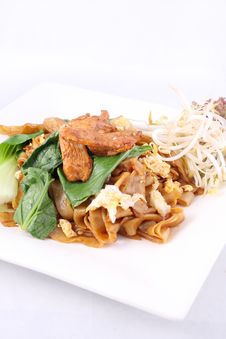 Asian Stir Fried Flat Rice Noodles. Pad Se Ew With Chicken. Royalty Free Stock Images Asian Stir Fried Flat Rice Noodles. Pad Se Ew With Chicken. Royalty Free Stock Images