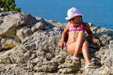 Girl Sitting On The Rocks By The Sea Stock Image Girl Sitting On The Rocks By The Sea Stock Image
