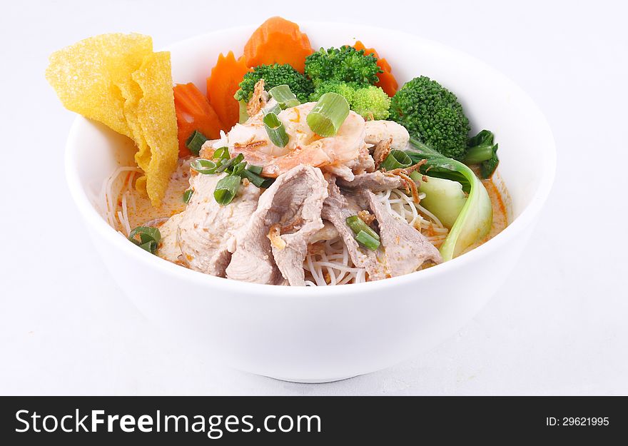 Laksa Noodle Soup With Chicken, Fresh Vegetables And Wonton On T