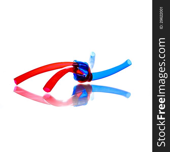 Two red and blue PVC Hoses tied