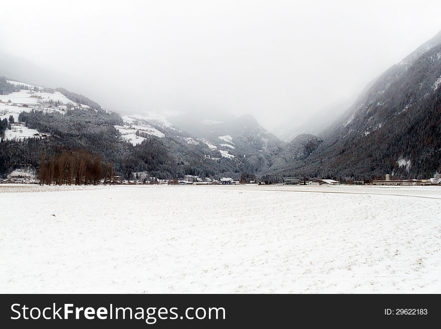 Winter view of campo tures in the fog