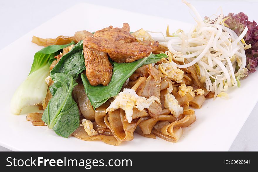 Asian Stir Fried Flat Rice Noodles. Pad Se Ew With Chicken.