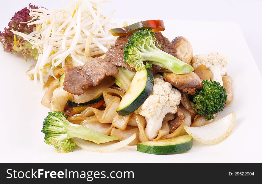 Flat rice noodle stir fried with oyster sauce and fresh vegetabl