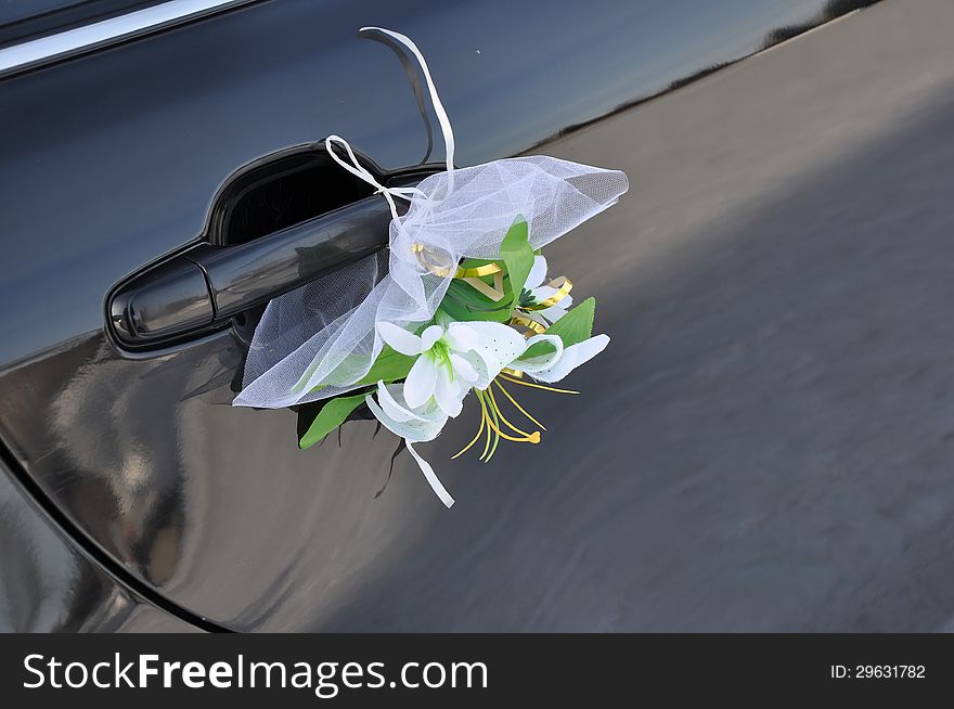 Wedding car decoration. Wedding cortege, delivers the groom and the bride to the wedding site