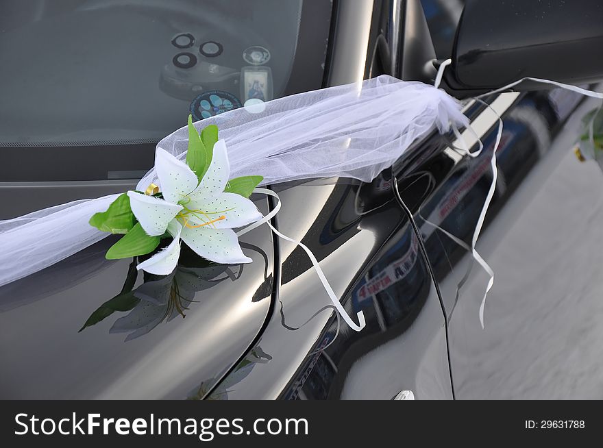 Wedding car decoration. Wedding cortege, delivers the groom and the bride to the wedding site