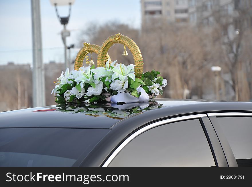 Wedding car decoration. Wedding cortege, delivers the groom and the bride to the wedding site