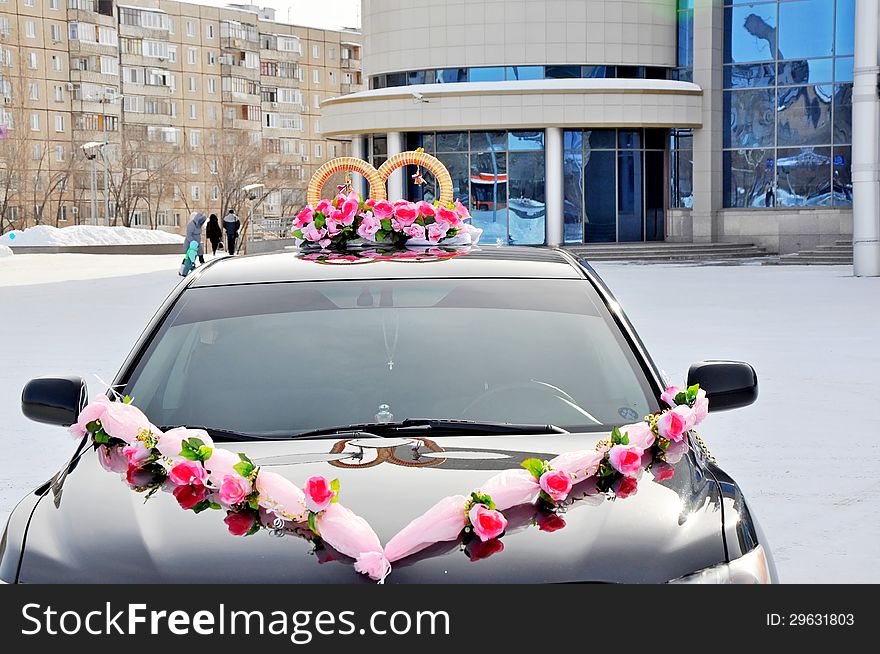 Wedding car decoration. Wedding cortege, delivers the groom and the bride to the wedding site