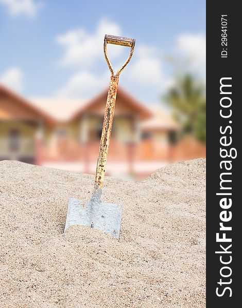 Shovel On Sand For House Construction in Thailand