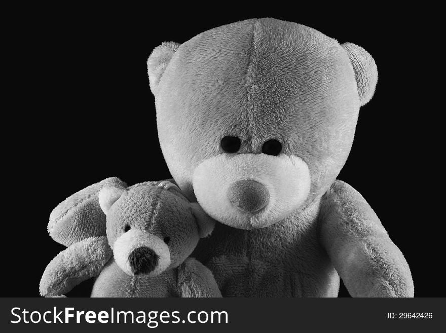 Plush teddy bears on black background. Plush teddy bears on black background