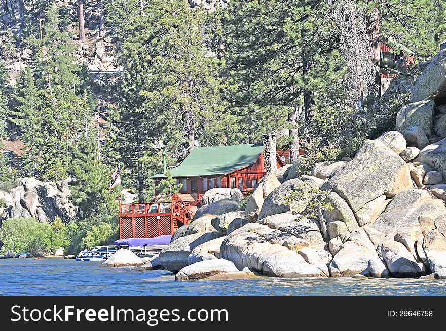 This is a summer cabin built at the west end of Big Bear Lake in a section of large boulders and pine trees. This is a summer cabin built at the west end of Big Bear Lake in a section of large boulders and pine trees.