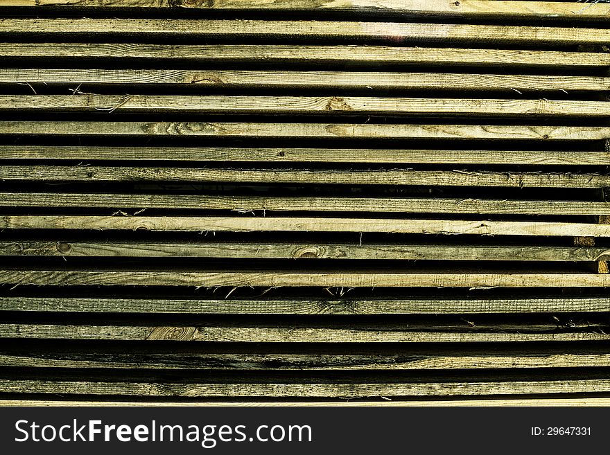Background of their horizontally lying wooden bars. Background of their horizontally lying wooden bars
