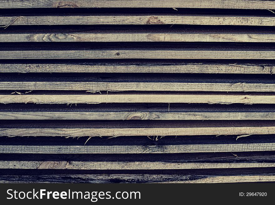 Horizontally lying wooden old bars