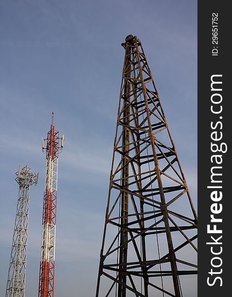 Utility pole and  lifting machine in construction site