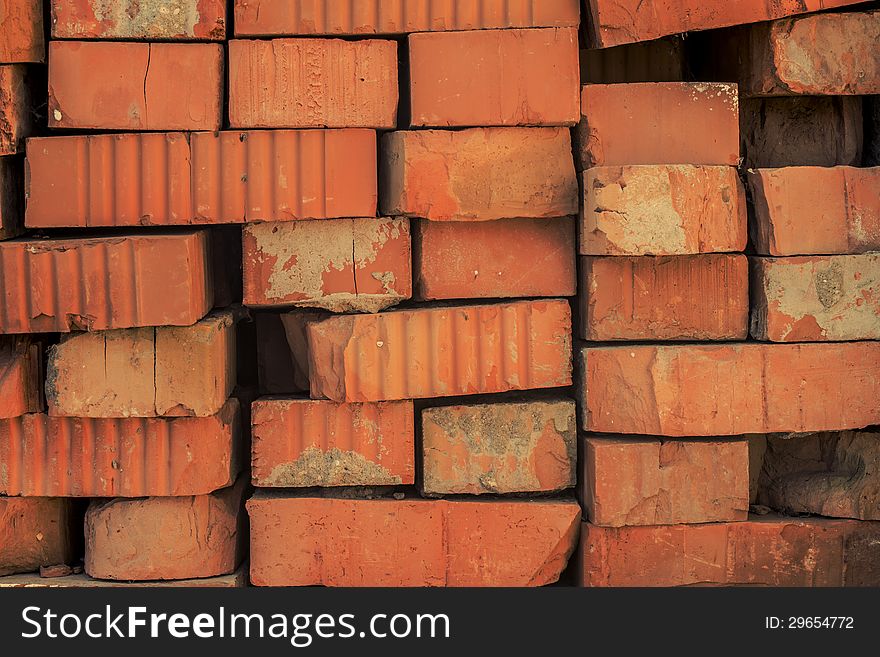 Background from red bricks randomly lying. Background from red bricks randomly lying