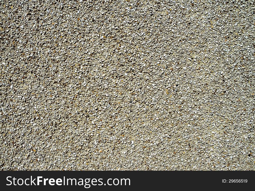 Wall from set of small stones as a background