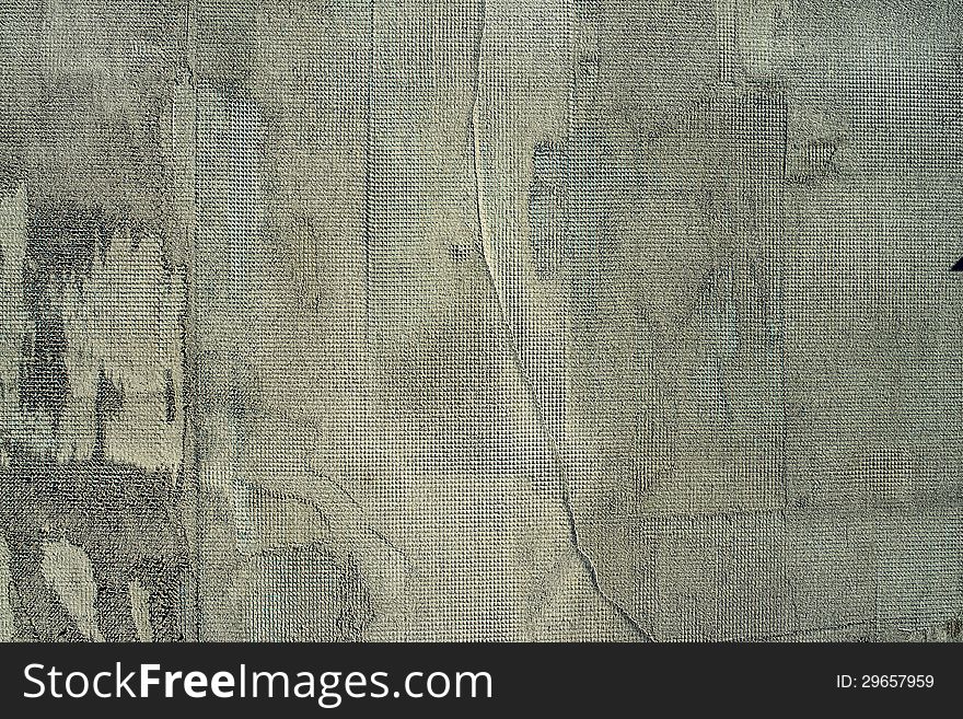 Old gray concrete wall with a grid as a background