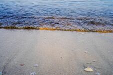 Close-up View Of Small Waves On The Shoreline. Royalty Free Stock Images
