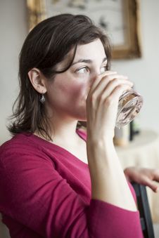 Beautiful Young Woman Drinks A Glass Of Water Royalty Free Stock Photography Beautiful Young Woman Drinks A Glass Of Water Royalty Free Stock Photography
