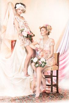 Sophistication. Old-Fashioned Concept. Two Pin Up Girls In Retro Dresses. Luxury Stock Photography Sophistication. Old-Fashioned Concept. Two Pin Up Girls In Retro Dresses. Luxury Stock Photography
