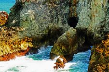 Rugged Rocks & Caves Of Tropical Island Cliff Stock Images Rugged Rocks & Caves Of Tropical Island Cliff Stock Images