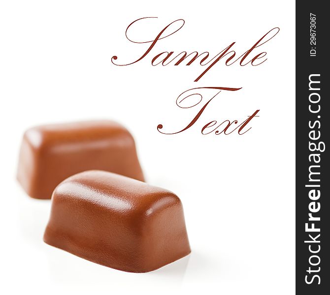 Chocolate Sweets isolated on a white background. Soft Focus. Sample Text. Chocolate Sweets isolated on a white background. Soft Focus. Sample Text.