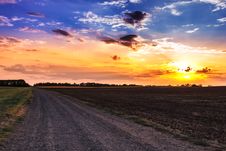 Sunset And Rural Road. Royalty Free Stock Images Sunset And Rural Road. Royalty Free Stock Images
