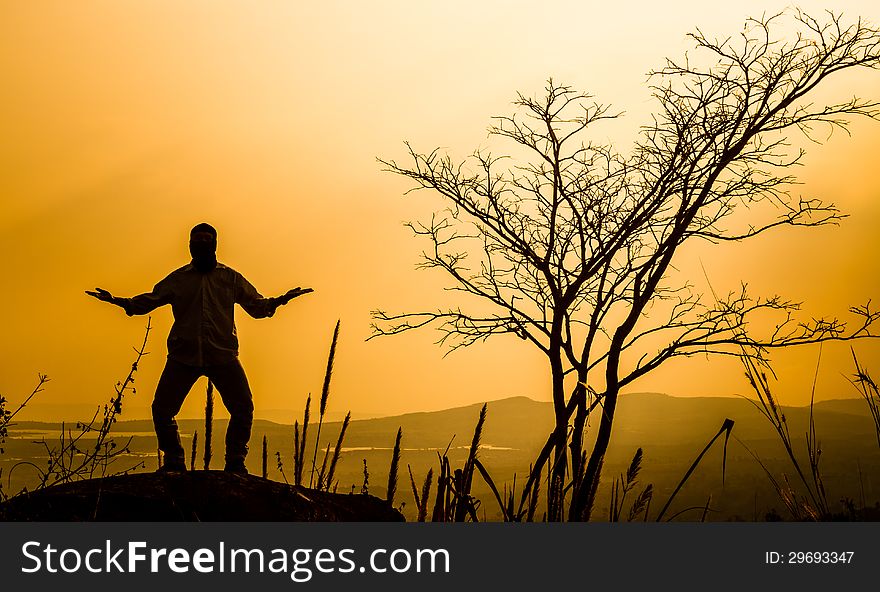 Praying man silhouette