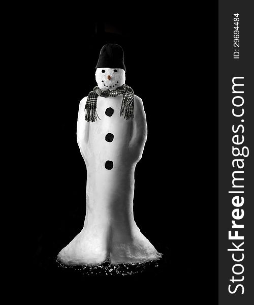 Real snowman photographed on black backdrop. Real snowman photographed on black backdrop