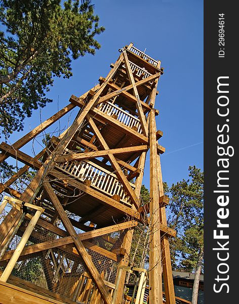 Lookout tower made of wood situated in the countryside. Lookout tower made of wood situated in the countryside