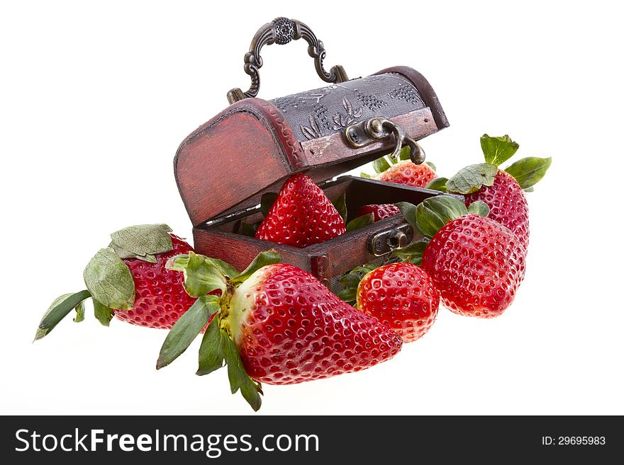 Treasure chest with strawberry isolated on white. Treasure chest with strawberry isolated on white