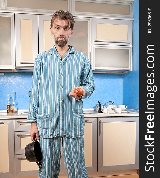 Drunk Man Standing In Pajamas With Onion